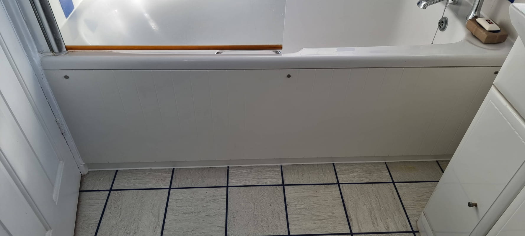 The repaired bath panel