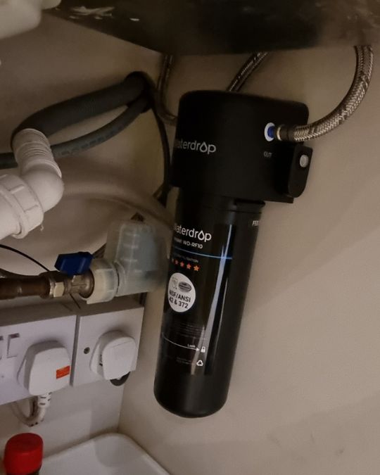 Waterdrop water filter fitted beneath a sink